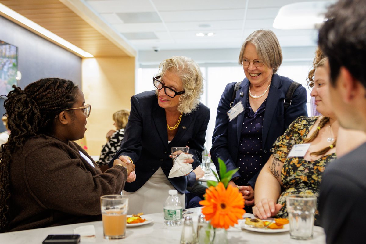 President Genco meets UB's newest Presidential fellows, Graduate School fellows and Arthur A. Schomburg fellows at a reception earlier this week.