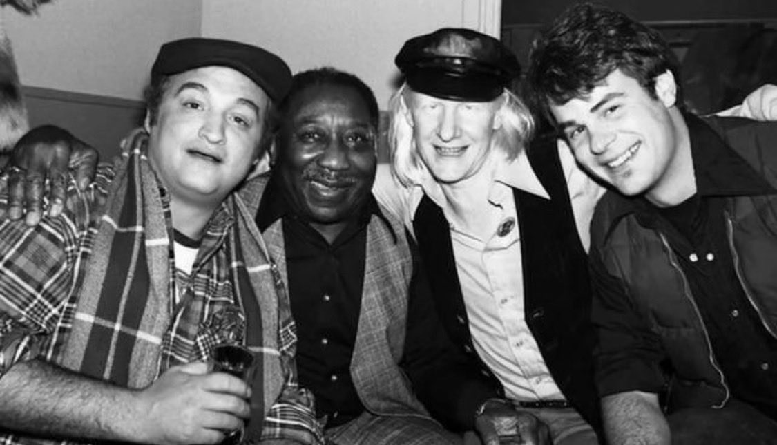 dan_aykroyd's tweet photo. New York City, 1977. John Belushi, Muddy Waters, Johnny Winter and me backstage at The Bottom Line. Four guys brought together by the blues.

We loved them and they embraced us. Johnny Winter frequently wore a Blues Brothers t-shirt on stage. 

Photo by Bob Gruen. https://t.co/Hcd1lKIg3O