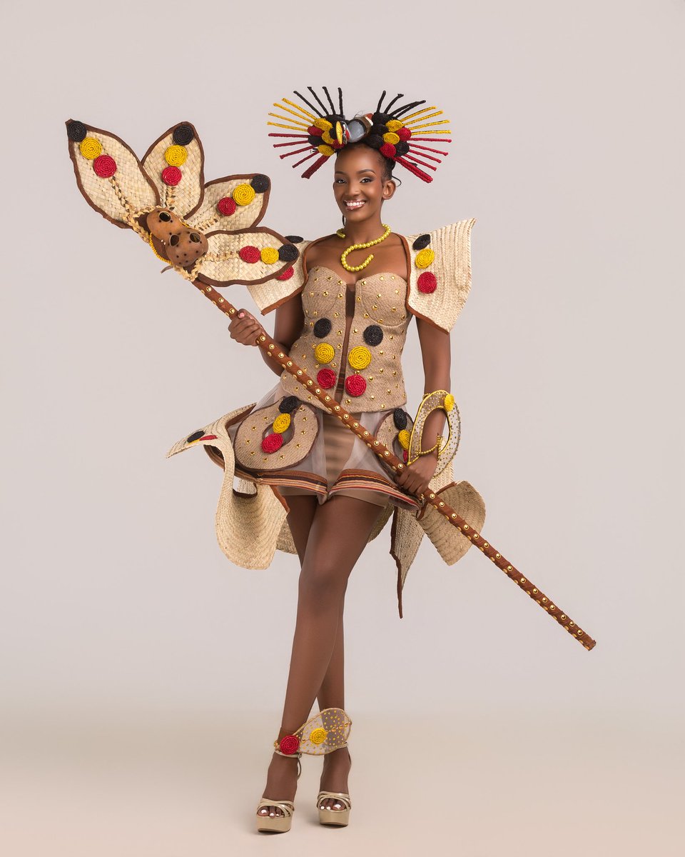 MuhozaElle's tweet photo. My national costume is a celebration of Uganda’s rich heritage, creativity and unity, bringing traditional craftsmanship into a bold contemporary expression.

The black, yellow and red proudly carry the colors of our national flag, while the woven textures honor Uganda’s tradition of working with natural materials. The striking circular patterns represent unity and the beautiful diversity of our communities, each different, yet belonging to one nation.

At the heart of the headpiece stands the Grey Crowned Crane, Uganda’s national bird, a powerful symbol of the country I am honored to represent.

More than a costume, this is a story of identity, heritage, craftsmanship and national pride. From the Pearl of Africa to the Miss World stage, I wear Uganda with pride.

#MissWorld2026 #MissWorldUganda #NationalCostume #Uganda #PearlOfAfrica #UgandanCulture #MuhozaTriviaElle #BeautyWithAPurpose #ForAllWomenAndGirls