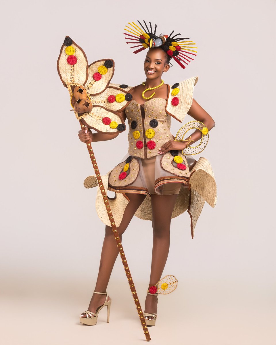 MuhozaElle's tweet photo. My national costume is a celebration of Uganda’s rich heritage, creativity and unity, bringing traditional craftsmanship into a bold contemporary expression.

The black, yellow and red proudly carry the colors of our national flag, while the woven textures honor Uganda’s tradition of working with natural materials. The striking circular patterns represent unity and the beautiful diversity of our communities, each different, yet belonging to one nation.

At the heart of the headpiece stands the Grey Crowned Crane, Uganda’s national bird, a powerful symbol of the country I am honored to represent.

More than a costume, this is a story of identity, heritage, craftsmanship and national pride. From the Pearl of Africa to the Miss World stage, I wear Uganda with pride.

#MissWorld2026 #MissWorldUganda #NationalCostume #Uganda #PearlOfAfrica #UgandanCulture #MuhozaTriviaElle #BeautyWithAPurpose #ForAllWomenAndGirls