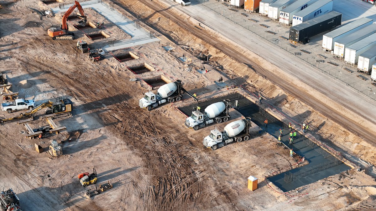 JoeTegtmeyer's tweet photo. Here is an update on the joint @SpaceX & @Tesla Advanced Technology Chip Fab Foundation construction at Giga Texas’s today. This will eventually grow to be about 470,000 Sq Ft (~45,000 Sq m) & requires a substantially different & vibration mitigation foundation which is what we are seeing in progress today.

The nearby concrete batch plant assembly continues too & this will be important for the final construction of this new facility which is a test bed in bout construction & operation for the much larger Terafab also beginning construction ~ 100 miles away in Grimes County.
