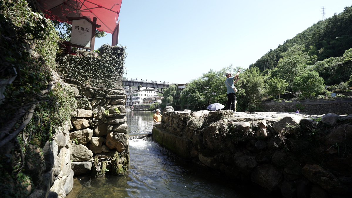 CGTNOfficial's tweet photo. In Yaoli ancient town, Jingdezhen, Jiangxi Province, history doesn't end at a monument.

It lingers on weathered brick walls and lives on in every meal, lane and ordinary day. This ancient town once witnessed people regroup and set out again. Today, life continues along the same stone-paved streets.

The road may change, and so may the times. But every generation has its own journey – and its own reason to keep moving forward. #LongMarch90 #LongMarchSnap