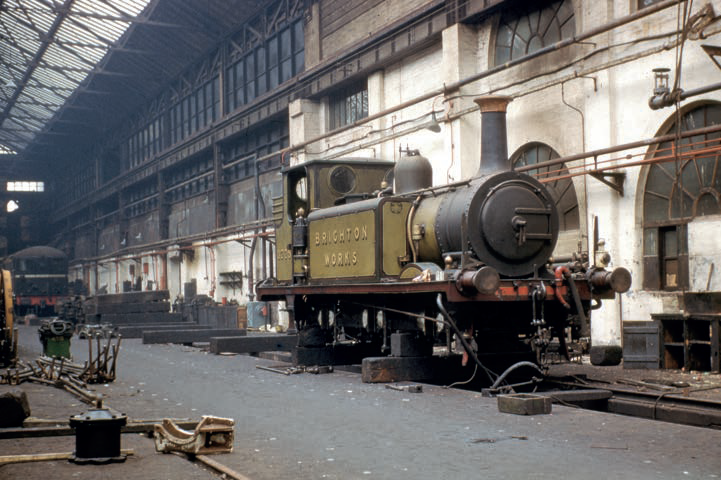 CrecyRail's tweet photo. Brighton Works at Brighton Works. In 1958 A1X No 377S (originally No 35 Morden, later No DS 377 and
from 1959 No 32635), the works shunter in LBSCR Stroudley livery, is being repaired. One of the trio of Bulleid diesels is in the background. https://t.co/Rz2dFLmY7S https://t.co/BJp39tIKko