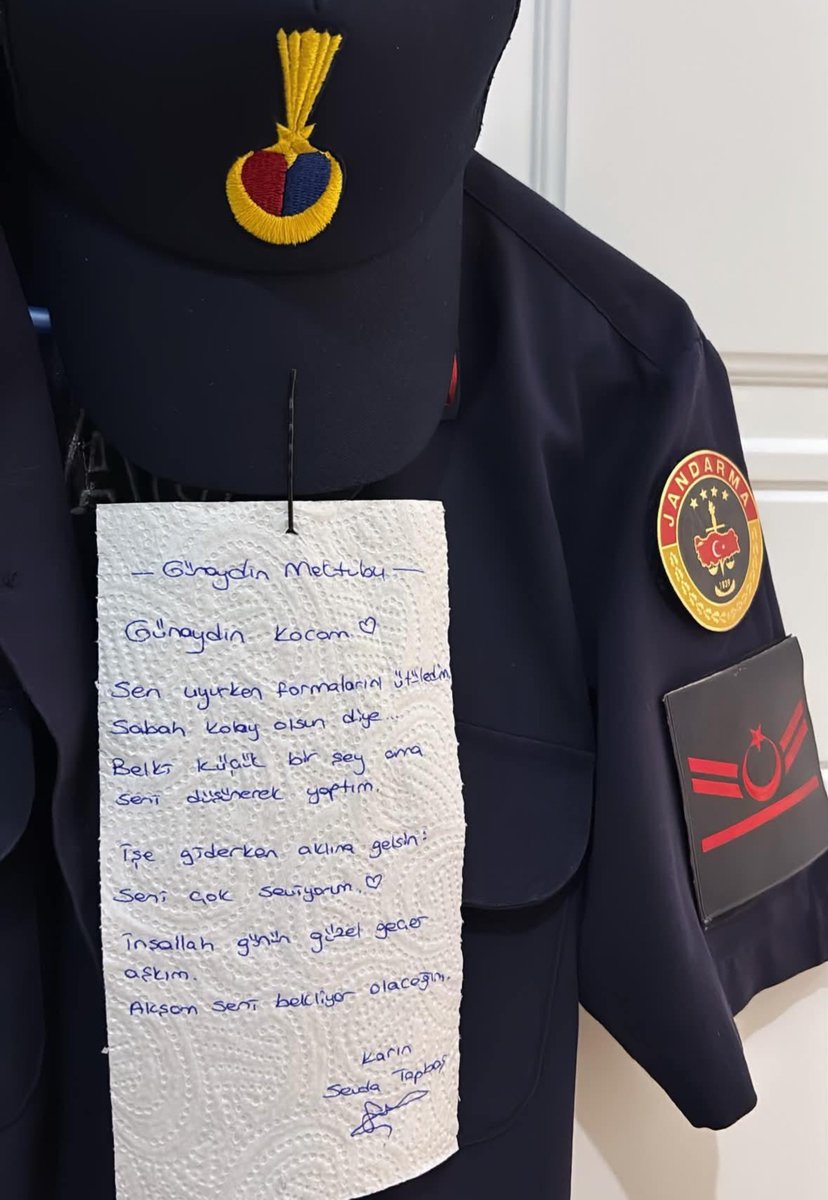 bayrakmedya's tweet photo. Bir ev hanımının eşinin üniforması üzerine aştığı yazı: https://t.co/LWBz0sErlN