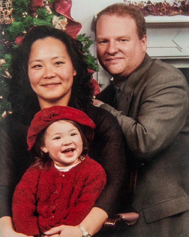 SlimWiggy's tweet photo. The Hanson family, Peter, Sue Kim and their 2 1/2 year old daughter Christine, were on their way to California to visit Disneyland and Sue Kim's family who'd not yet gotten to meet little Christine. 

They tragically changed their flight last minute from September 10th after Peter was called into a meeting. 

Peter was in marketing and Sue Kim was a doctoral candidate in microbiology immunology at Boston University. Christine was their only child and loved Mickey Mouse. 

Peter called his father Lee from Flight 175 (the second plane), informing him it was being hijacked and asking him to call the FBI. 

In his second call Peter told his parents that the hijackers had boxcutters and had killed a stewardess. His parents were watching the nightmare unfolding on TV, the devastating of Flight 11 having already hit the North Tower. 

Peter said he didn't know where they were but feared they were going to fly into a building. As recounted by his mother Eunice, he told his dad, "Don't worry, it'll be quick," before saying "oh my God, oh my God. Lee heard a crash. He hung up the phone and was never the same."

This is one of those stories that has been seared into my memory since the week of 9/11, the initial reports mentioned the Peter and Sue Kim keeping little Christine calm so she wouldn't be frightened despite knowing what was about to happen. 

It was Christine's first plane ride and she's generally considered the youngest victim of 9/11. Dad and grandfather Lee Hanson passed away in 2018 at the age of 85. 

The Hanson family were m*rdered by Muslim terrorists Marwan al-Shehhi, Fayez Banihammad, Mohand al-Shehri, Hamza al-Ghamdi and Ahmed al-Ghamdi.