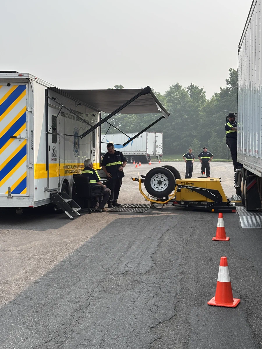 New York State Police use a portable scale during a safety investigation on I-81. 