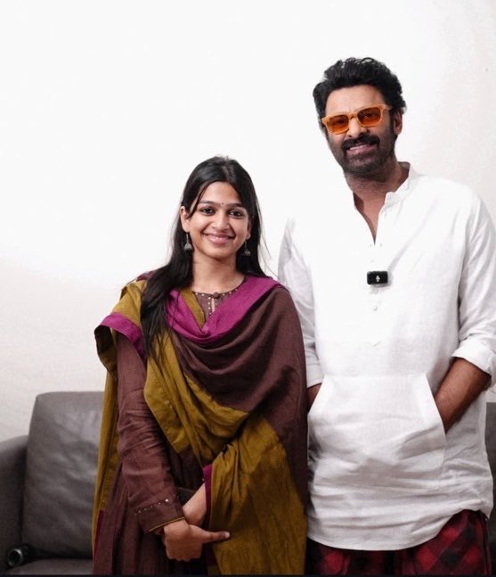 Prabhasfan666's tweet photo. It’s great, but #Prabhas Anna why those costumes &amp; glasses?

Wear a blazer over a tucked-in formal shirt and remove the glasses for photos. With your face cuts and body frame, they’ll look terrific!

Even short &amp; ugly plastic surgery heroes like AAthu are managing better pics. https://t.co/eXn7ihd3jR