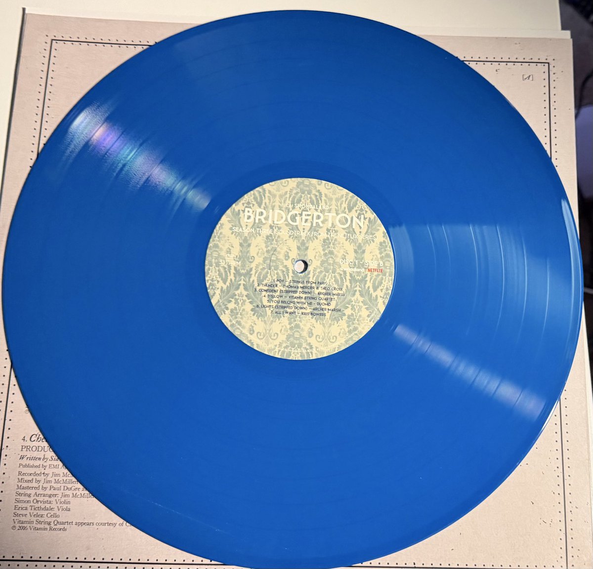 TooTall4Heels's tweet photo. This arrived today! I now have the blue vinyl “Colin’s Blue Eyes” edition to go along with the yellow/gold “Wedding Ring Gold” vinyl.💙💛 #Polin @bridgerton “Your eyes are the most remarkable shade of blue. And yet somehow they shine even brighter when you are kind.”-Penelope 🥰 https://t.co/aUysCR2ukf