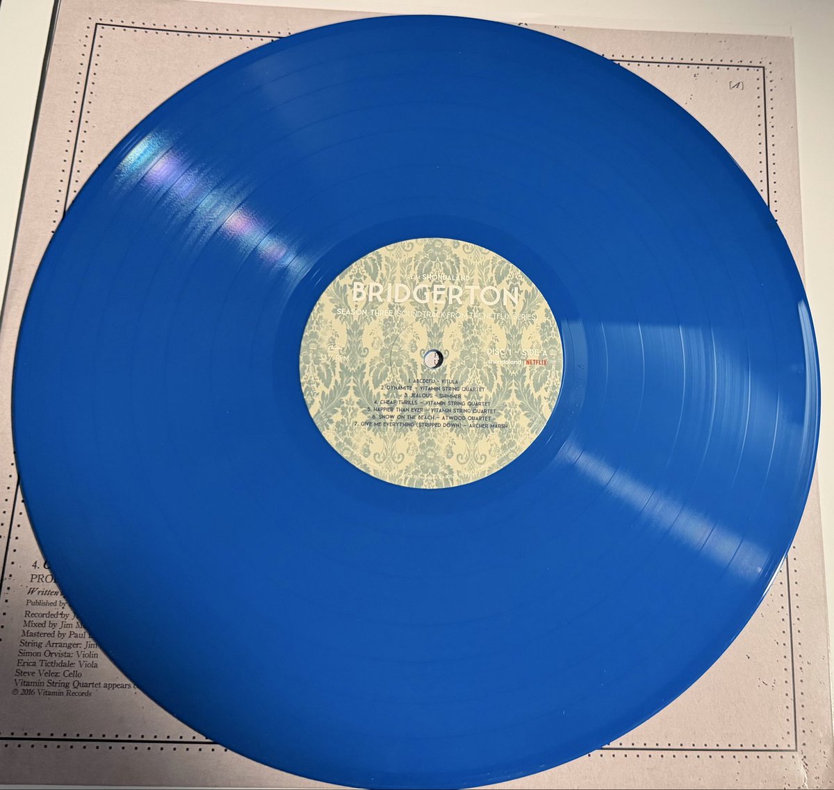 TooTall4Heels's tweet photo. This arrived today! I now have the blue vinyl “Colin’s Blue Eyes” edition to go along with the yellow/gold “Wedding Ring Gold” vinyl.💙💛 #Polin @bridgerton “Your eyes are the most remarkable shade of blue. And yet somehow they shine even brighter when you are kind.”-Penelope 🥰 https://t.co/aUysCR2ukf