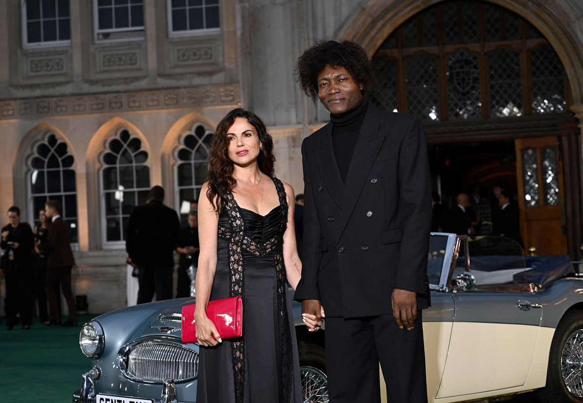 mediaplp's tweet photo. 📸 | Benjamin Clementine and Lana Parrilla attend "The Gentlemen" Season Two World Premiere at Guildhall on September 02, 2026 in London, England. https://t.co/FOaPb3T9AL