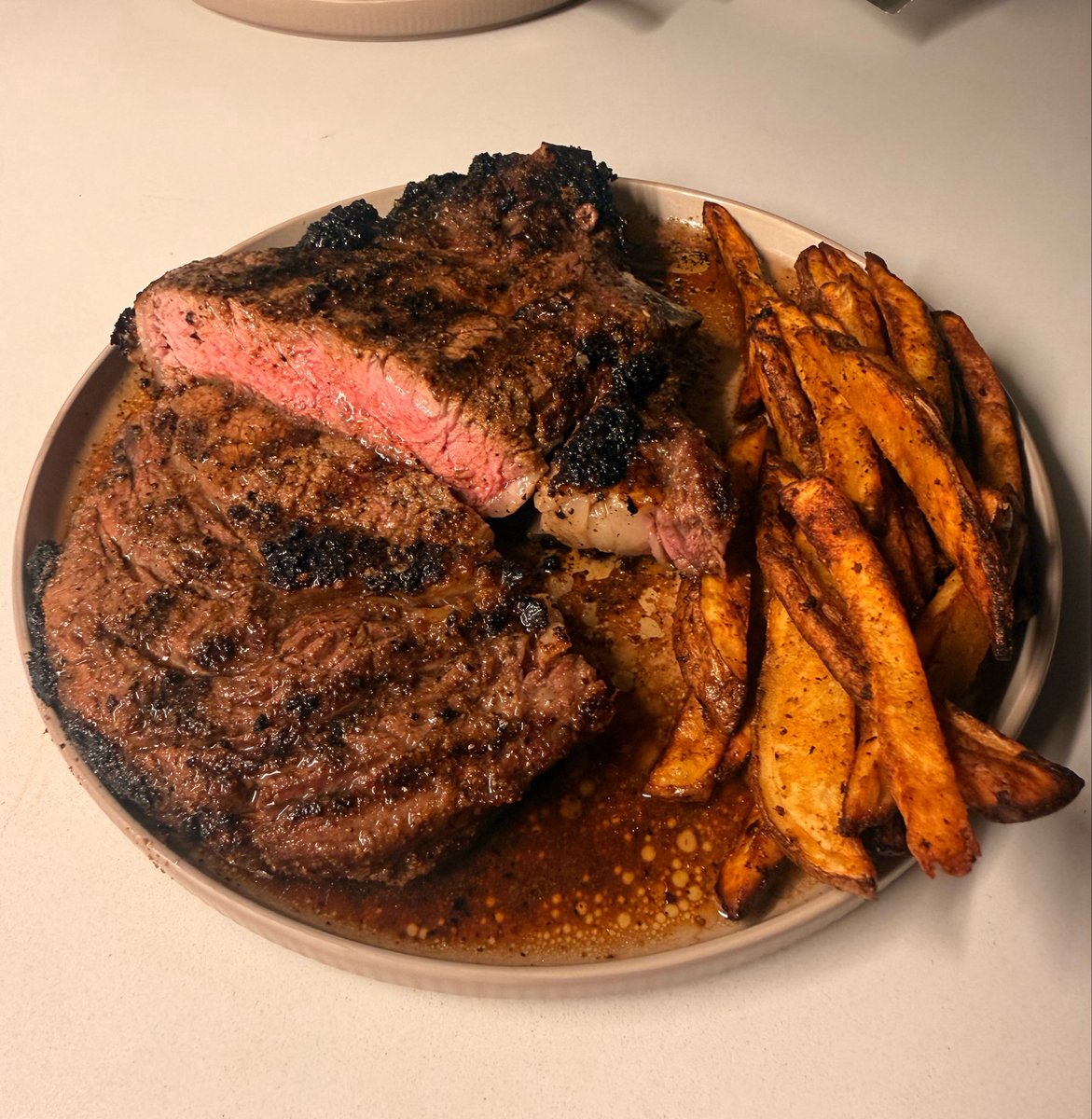 miasweitz's tweet photo. You already know what’s up. First time grilling a bone in ribeye! How did I do? #steak https://t.co/Jj9Kf8bdUW