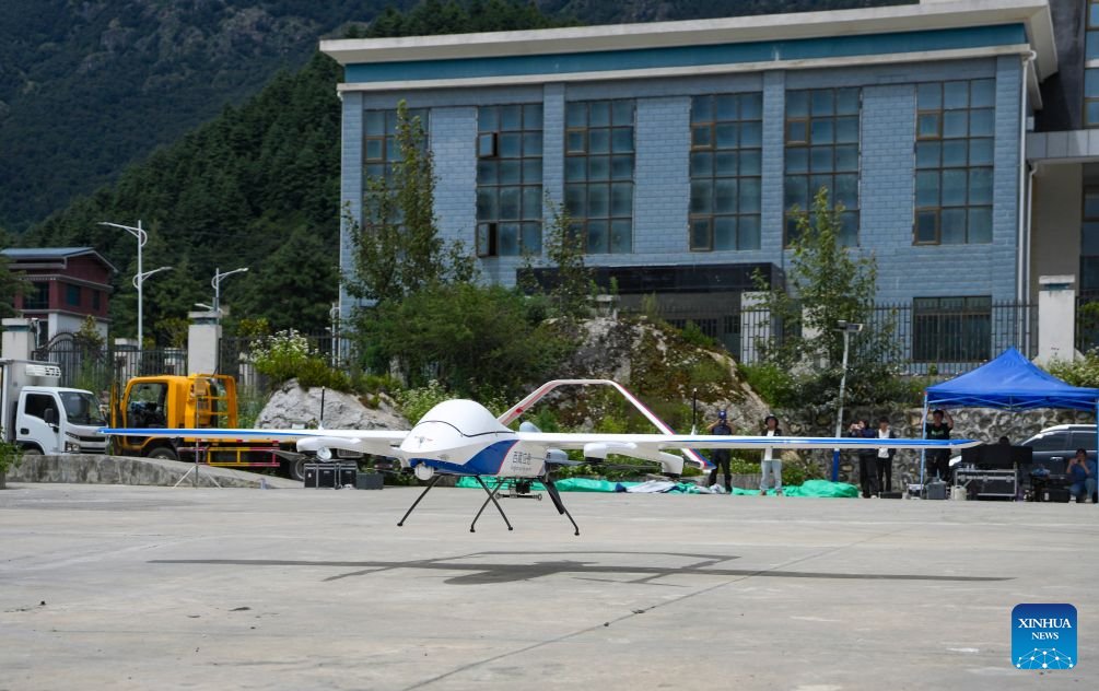 ChinaScience's tweet photo. The local emergency management department in southwest China's Xizang Autonomous Region has dispatched a drone detection team to carry out disaster assessment missions in the mudslide-hit Gyirong Town.   

The medium-sized composite-wing drone has monitored the conditions of the barrier lake and the mountain terrain in the area affected by the mudslide, providing critical information to support search and rescue operations.