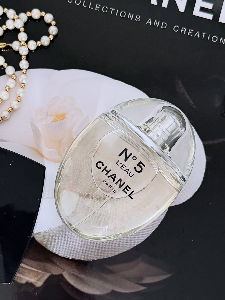 PorshaSiegkh's tweet photo. Timeless elegance by Chanel. A flatlay of Chanel No. 5, where fragrance meets iconic luxury beauty. https://t.co/ilkZVFNcVb