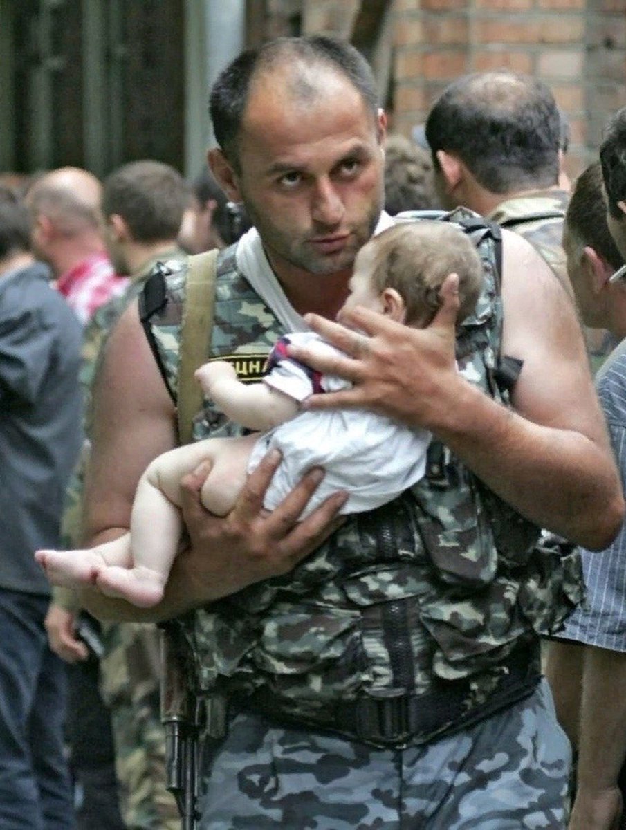 caucasusvisuals's tweet photo. Militsiya Lieutenant Elbrus Gogichaev with 6-month-old Alyona, whom he rescued during the terrorist attack at the Beslan school. North Ossetia, September 3, 2004.

In the second photo, they are pictured in the present day. https://t.co/QJ1iqFlX5U
