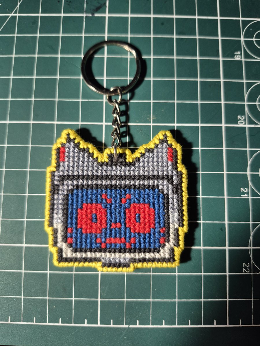 Dashata270's tweet photo. Hey everyone, made a double-sided keychain with Kerfur! 😼🤖
#Votv #Kerfur #CrossStitch #Keychain https://t.co/VV4jfeUXlP