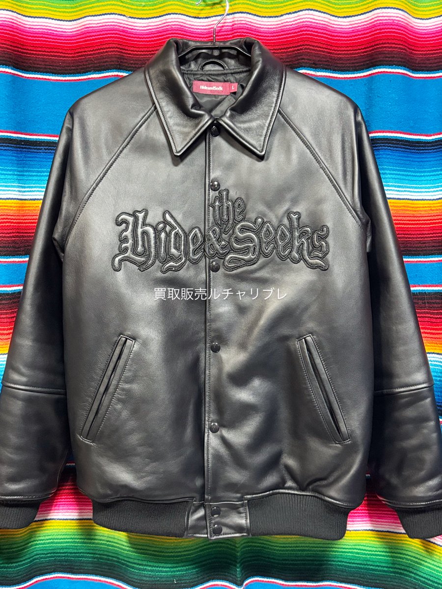 Babydohe's tweet photo. Pre-owned arrival: HIDEANDSEEK 30th Anniversary Spot Item × Toru Nishiura Collection Leather Varsity Jacket. Black × Black, size L. Kyoto store hours: around 1 PM–10 PM. In-store, mail-in, and home pickup purchases available. https://t.co/Jp18YV4CWn