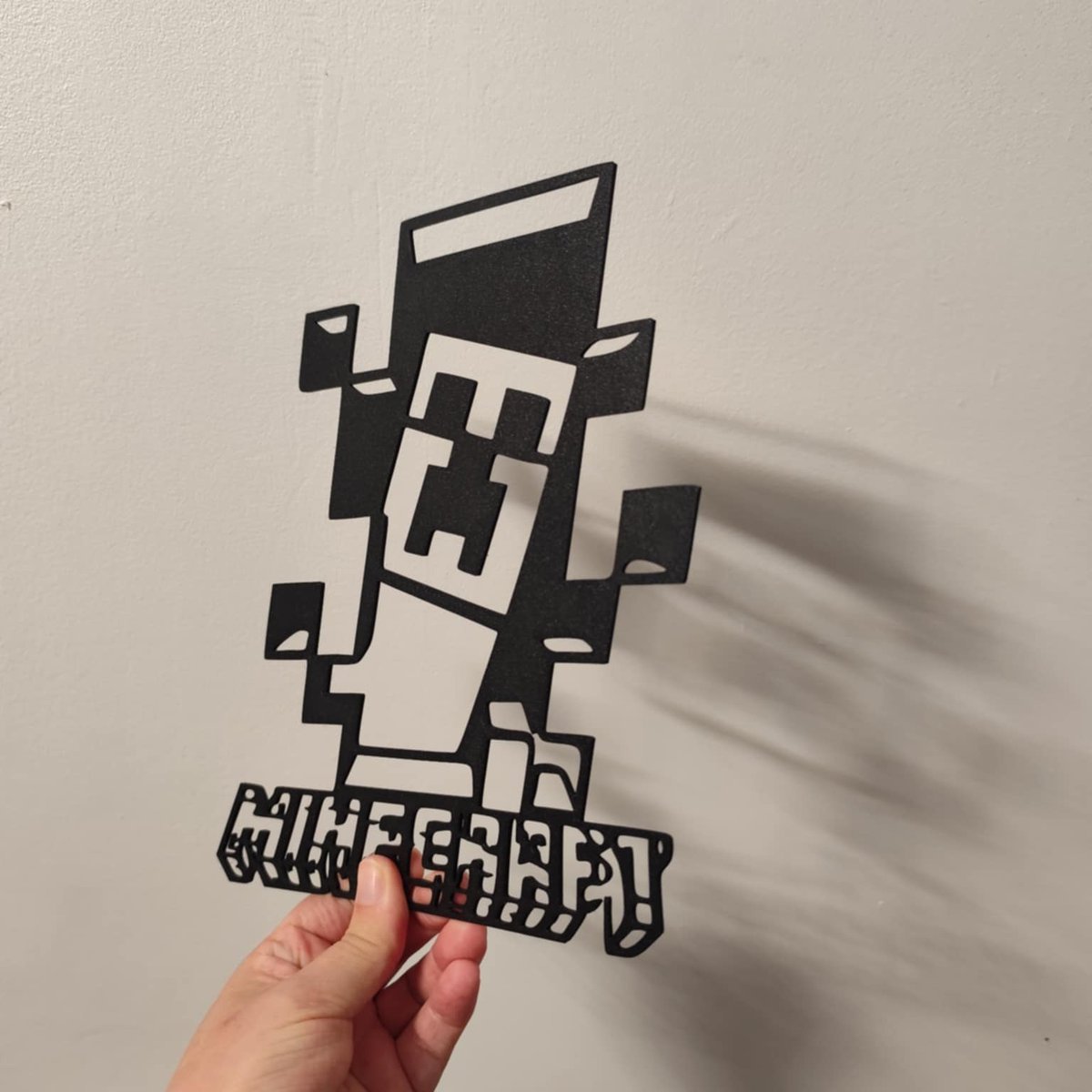 SelmaGuiles's tweet photo. Minecraft Wall Decor – Legendary Pixel Style – €3

Dimensions: 23 cm x 23 cm 
Add a 100% geeky retro touch to your space with this stylish Minecraft decor. Black cutout design featuring a pixel character and iconic logo. Lightweight, easy to hang, https://t.co/mDvasXlLiX