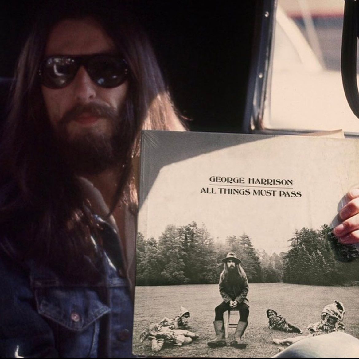 BeatlesEarth's tweet photo. George Harrison showing off his new album, "All Things Must Pass" (1970) https://t.co/CwOvhvndsv