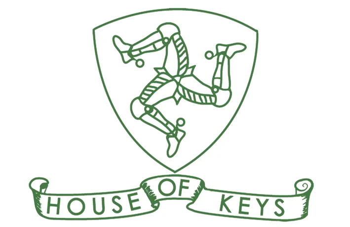 The House of Keys green shield with the Three Legs of Man on it and underneath on a scroll the words 'House of Keys'. 