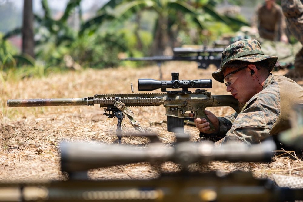 MRFDarwin's tweet photo. U.S. Marines with A Co., 1st Bn., 5th Marines, participated in a live-fire sniper range with Japanese soldiers with 2nd ARDR, and Indonesian marines with 7th Infantry Bn., as a part of Exercise Super Garuda Shield 26.

#Marines #USMC #MRFD #KORMAR #JGSDF #SGS26 https://t.co/y9tUNTTZNd