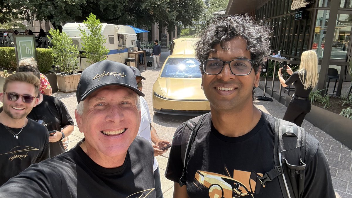 JoeTegtmeyer's tweet photo. What is one “Mod” I recommend to the Cybercab team that can make cleaning it much easier and with no added cost? 

Drain holes in the rear tub! Just spray it out and it’ll drain on its own. Easy clean, minimal time and good to go!

Oh, I got to meet @aelluswamy too! https://t.co/FOCVxQtvZ0