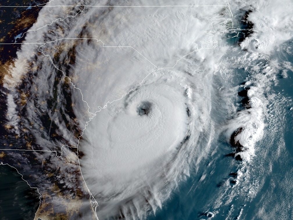 jamiearnoldWMBF's tweet photo. HAPPY RED JEEP DAY to all who celebrate?  For those who may not know, it was on this day in 2019 that category 2 Hurricane Dorian passed just 50 mile off shore of Myrtle Beach.  In the height of the storm, a red Jeep Grand Cherokee was left locked and abandoned in the surf near 38th Avenue North in Myrtle Beach.  The stranded vehicle quickly became an internet sensation and a symbol of the storm. "Jeep Watch 2019" provided moments of laughter in an otherwise stressful day.   Dorian brought 15 tornadoes to the Carolinas including Little River, North Myrtle Beach, Socastee and Calabash.  Rainfall across the Grand Strand reached as high as 15 inches in Pawleys Island and 12 inches in Myrtle Beach. #SCwx @wmbfnews #MyrtleBeach