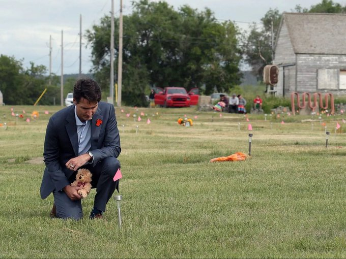 Martyupnorth's tweet photo. Someone should have told him he was standing in the middle of an old sceptic field, and those flags are from a line locator identifying buried pipes. https://t.co/e8GNaAspFI
