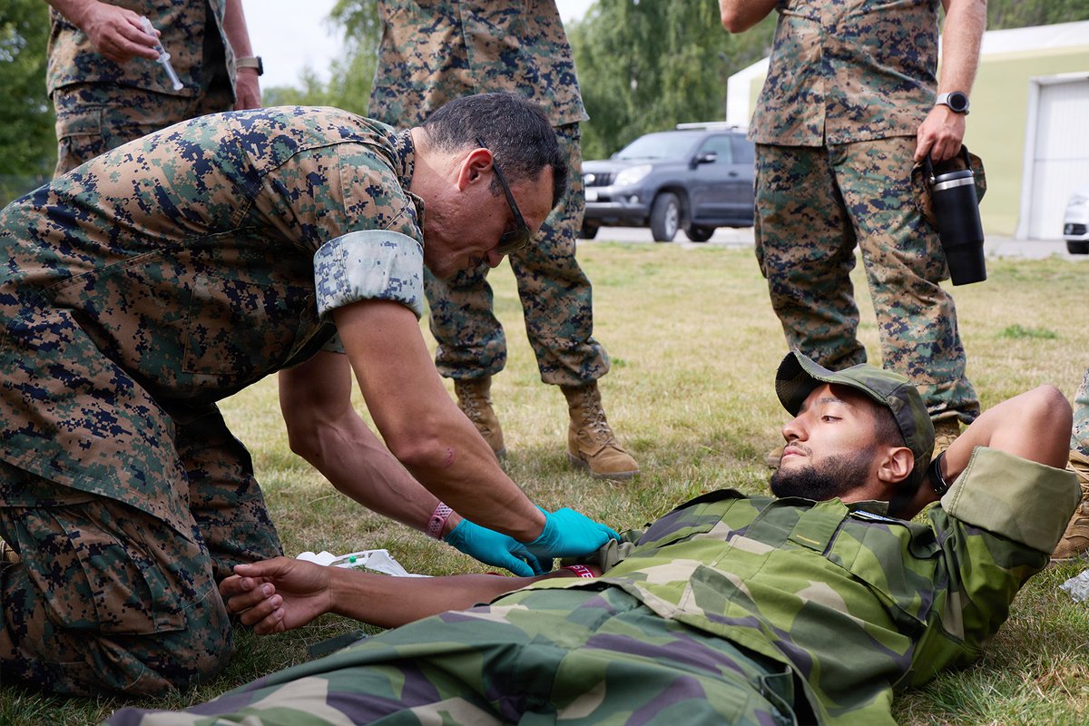 U.S. Navy corpsmen and Swedish service members conduct simulated casualty care during a medical exchange in Sweden.