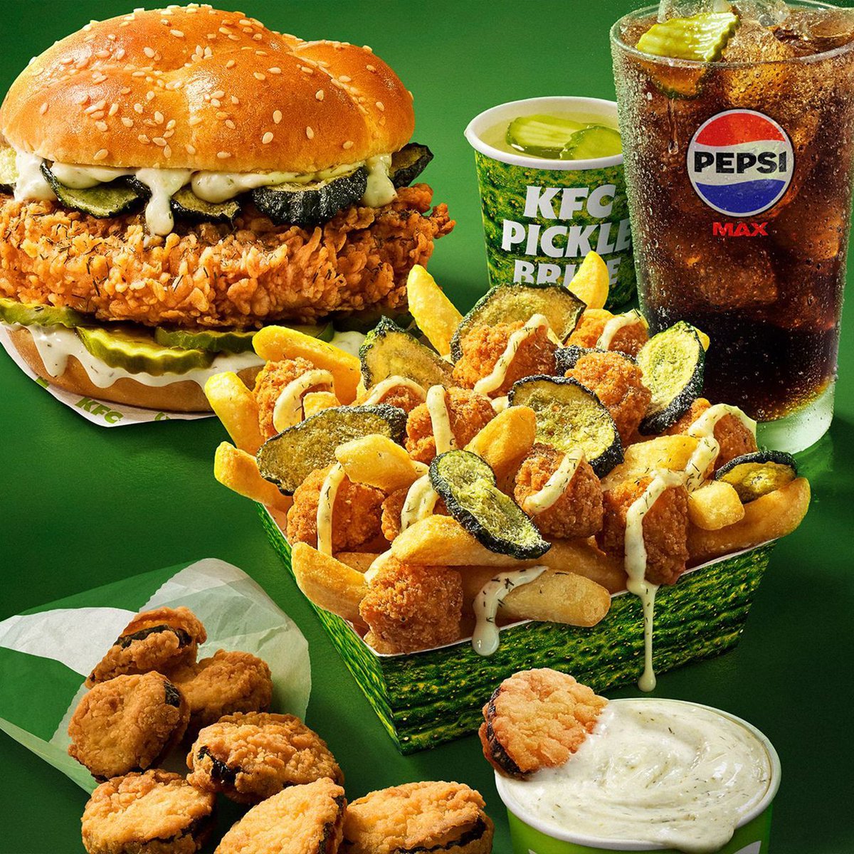 Dexerto's tweet photo. KFC is launching a new Picklecore menu that includes a Pickle Burger, Frickles, pickle Pepsi Max, and even a Pickle Cheesecake

The range is available in Australia until September 28 https://t.co/eMajFeqsxN