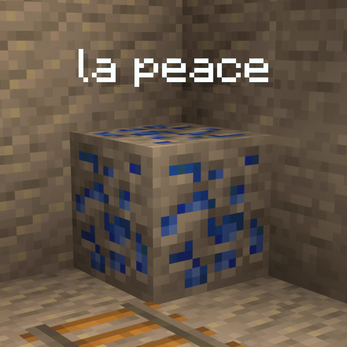 image of a lapis lazuli ore block in Minecraft. Copy on top of the screen reads "la peace"