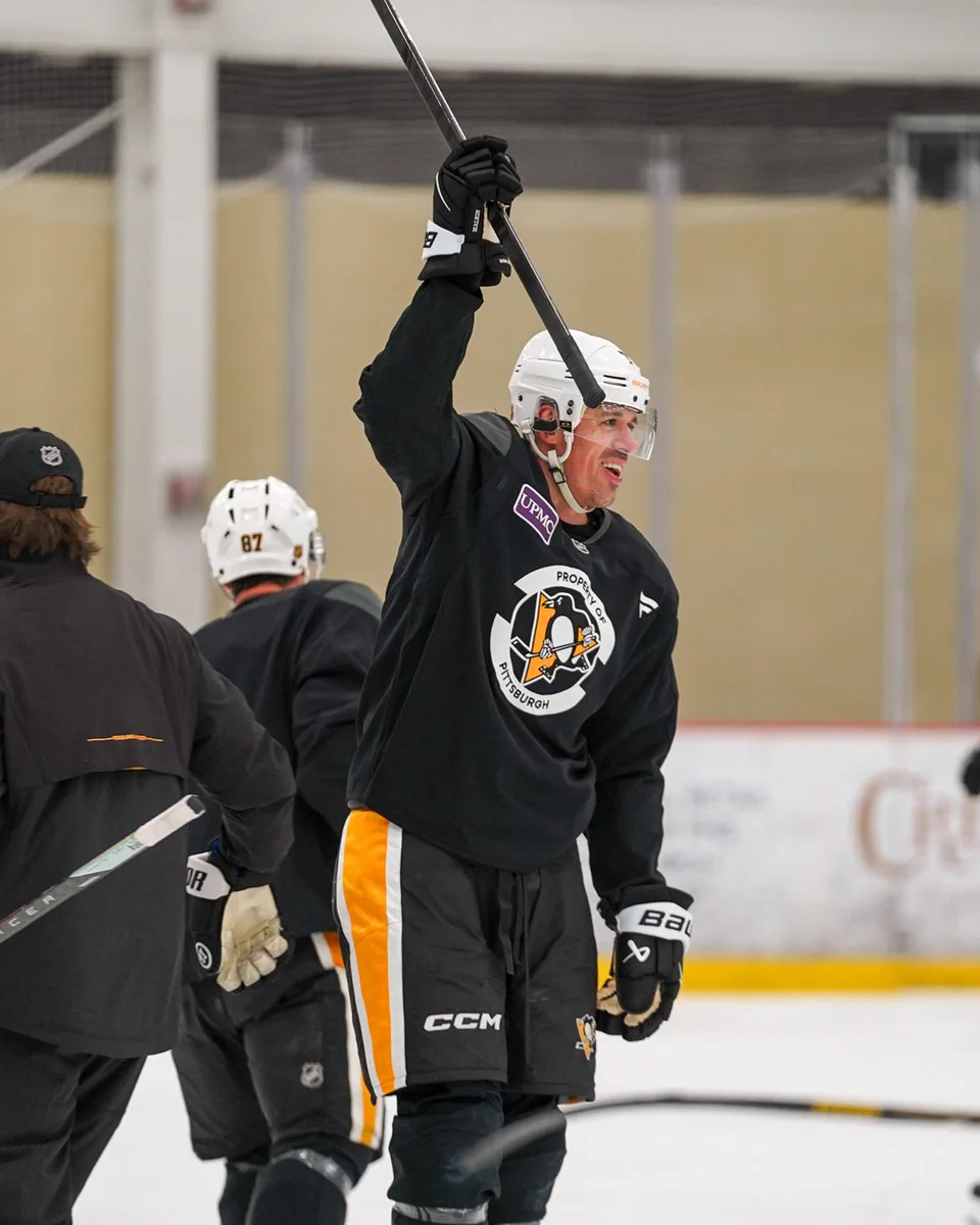 Evgeni Malkin celebrates at practice.
