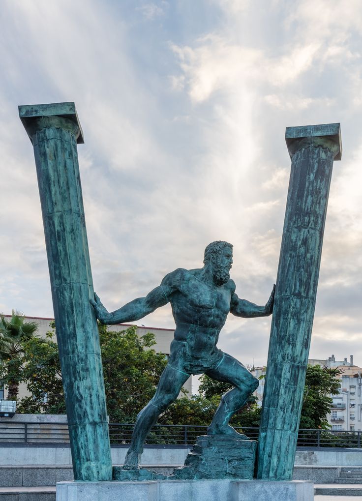 xmuse_'s tweet photo. These statues in Ceuta mark one of the most legendary borders in ancient geography. 

To the Greeks, the Pillars of Hercules were where the Mediterranean stopped and the unknown Atlantic began. 

Ceuta sits at the edge of what ancient maps saw as the boundary of human exploration. 

The 2 bronze works show Hercules forcing the pillars apart and pulling them back together, each a 7 meter, 4‑ton piece completed in 2007 by Ginés Serrán‑Pagán.