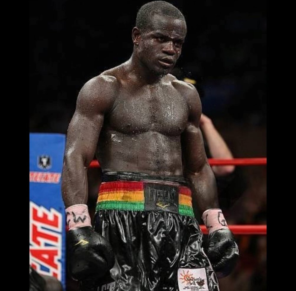 hansandoh's tweet photo. Dude built crazy shoulders without really lifting weights. An insane amount of running, sparring and pad work. And the names on his resume...Zab Judah, Miguel Cotto, Antonio Magarito, Manny Pacquiao, Diego Coralles, Anthony Mundine. 
Nothing flashy, he wasn't there to knock opponents out. Just a disciplined jab behind a brick wall of a high guard. Hardly anything gets through. 
You won't knock him out, no one did. You had to go the distance. And that's what broke most of his opponents. 
Because you'll throw everything and he'll still be right there...in your face. 
Joshua Clottey...Grand Master for a reason.