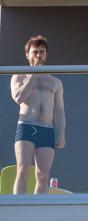 Francoballer1's tweet photo. Daniel Radcliffe goes shirtless in his underwear, enjoying a cigarette on a hotel balcony. https://t.co/lXXm2uLqbw