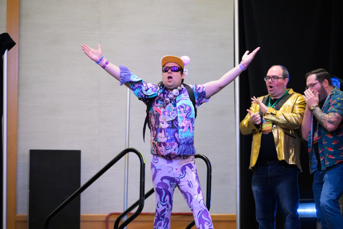 TaylorBMcardle's tweet photo. Always trying to bring some Glimmer of hope to every convention I attend. Can’t believe I have officially been in this fandom for now over 10 years! Crazy still to think how pastal ponies have forever changed my life. Here’s to many more years of fun! 💜💜 #EFNW2026 @EverfreeNW https://t.co/5WKIUocvwm