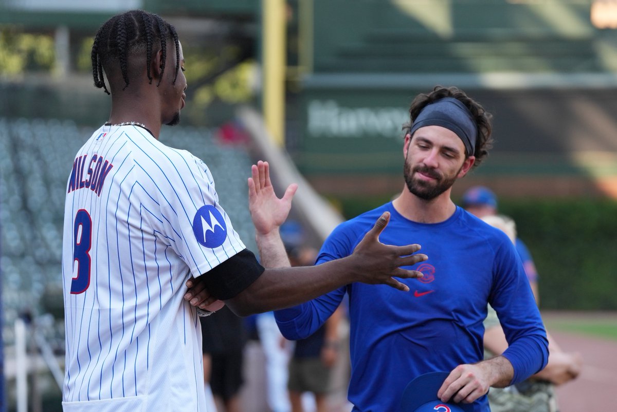 MLB's tweet photo. Chicago Bulls rookie Caleb Wilson visits Wrigley Field! https://t.co/5FPObOCZwu