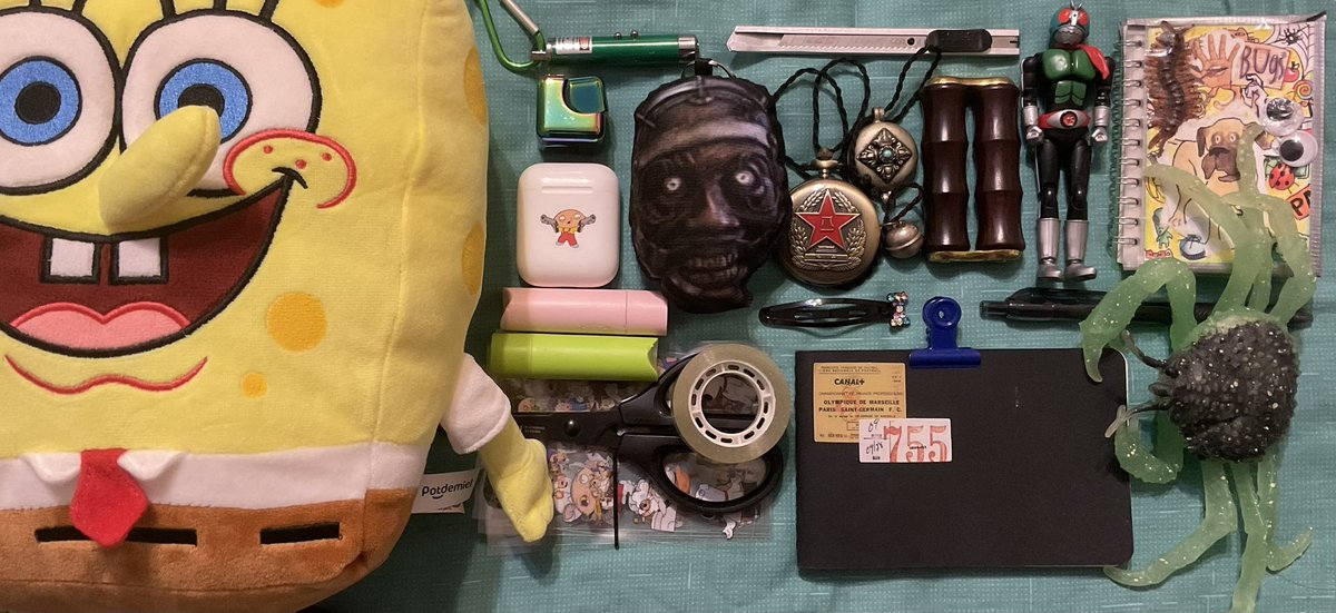 Grendpateddo's tweet photo. spread of some stuff from my carry-on for plane tomorrow https://t.co/geNovvUq34