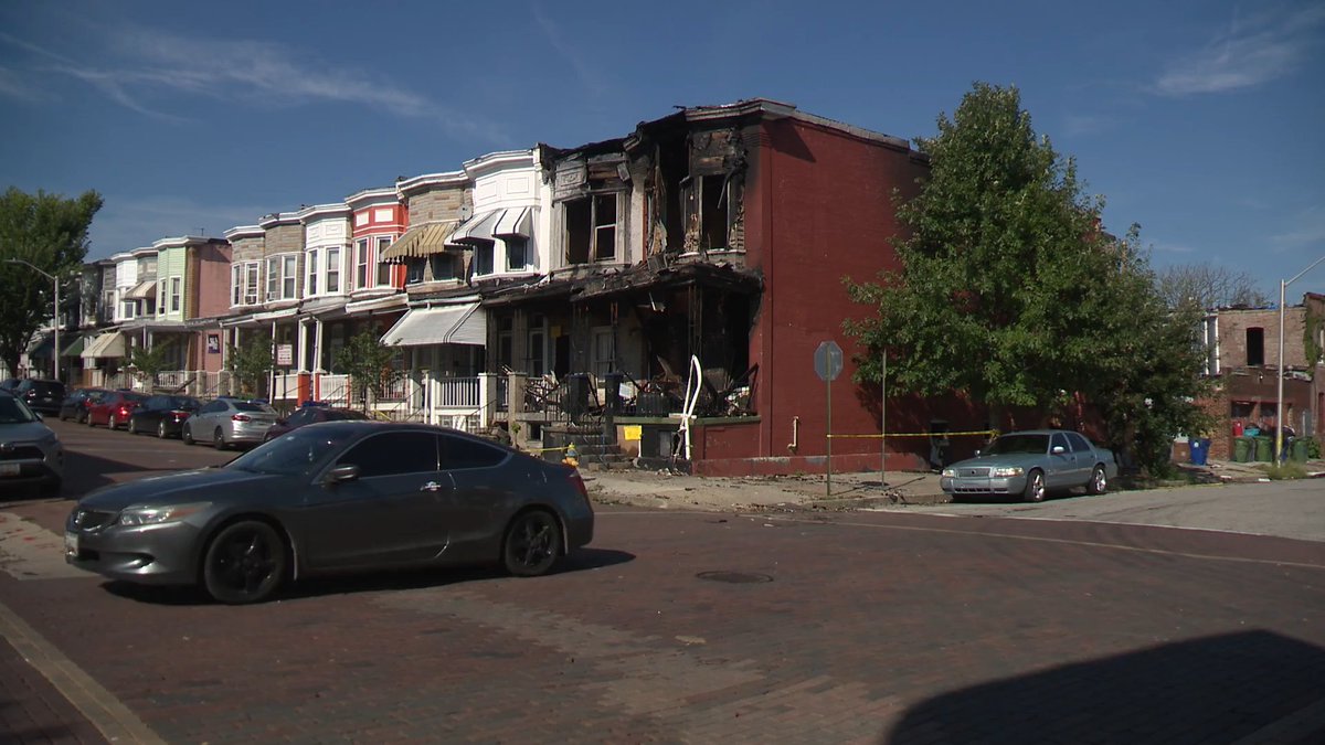 FOXBaltimore's tweet photo. A rowhome fire in west Baltimore that spread from a vacant house to neighboring properties is renewing concerns from residents about squatting and illegal activity inside the city’s many vacant buildings.

LATEST DETAILS: https://t.co/xdjPDN3Q6L https://t.co/2UVXsdE1lQ