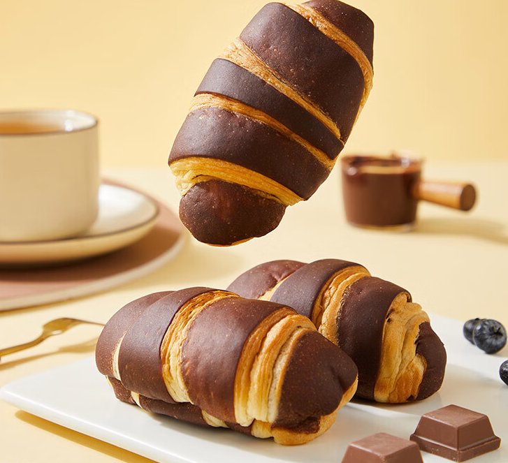 Pount864's tweet photo. Midnight snack win: warm chocolate croissant oozing with molten dark chocolate, paired with a cold cup of oat milk. Perfect little comfort after a long day. https://t.co/MVQhmurcrI