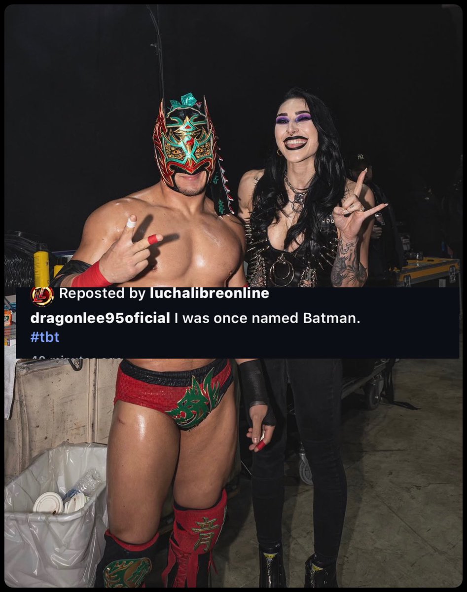 FadeAwayMedia's tweet photo. Dragon Lee with Rhea Ripley backstage and recalled this moment where she called him Batman. 💀

“I was once named Batman” https://t.co/tzAoVhGA2z