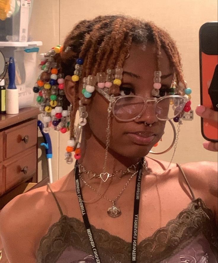 barkgrl's tweet photo. ill never forgive the black community for tryna put a age limit on beads, it’s literally one of the most beautiful forms of black alternative fashion https://t.co/qKkenJmOpk