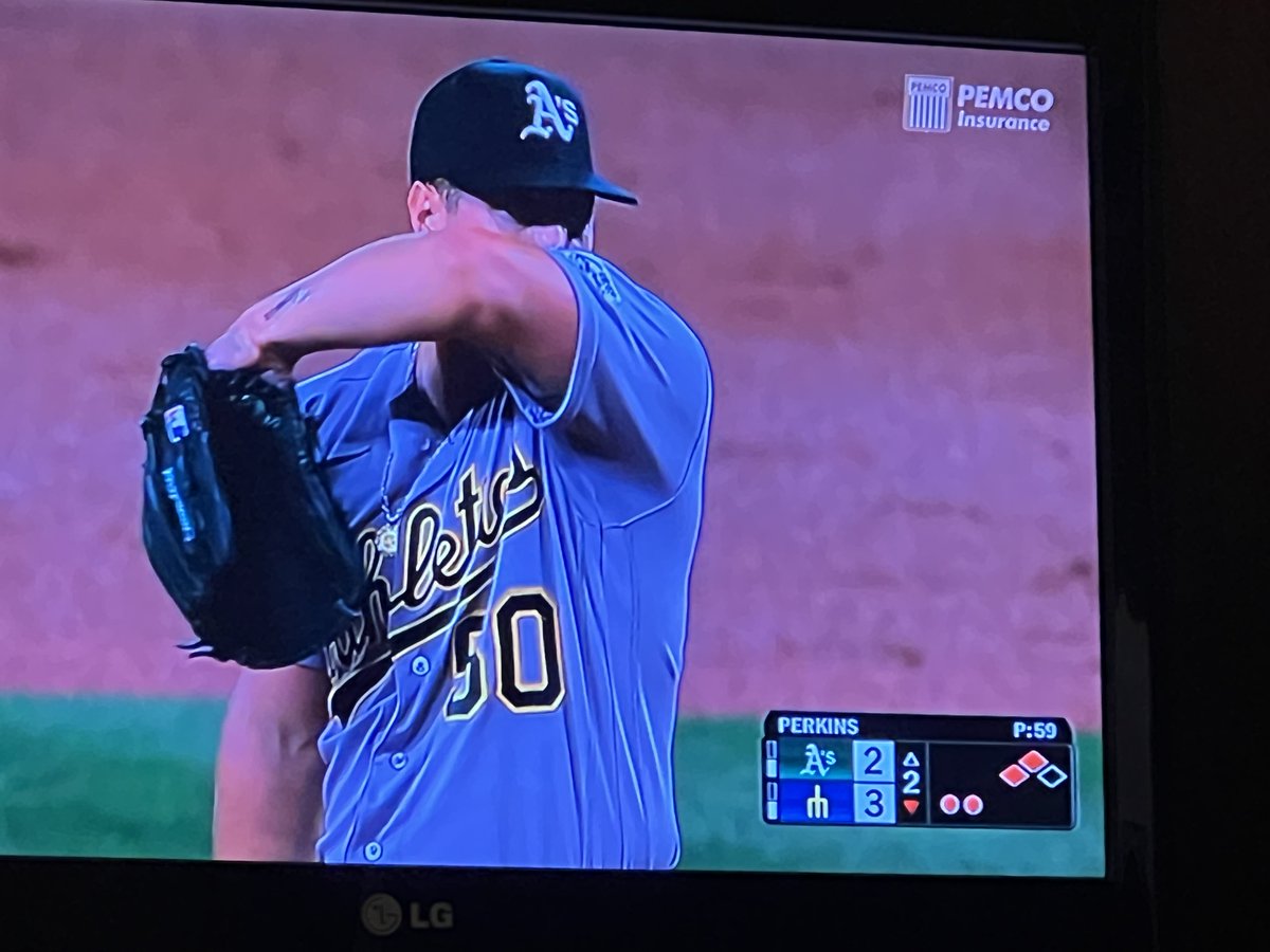 beoduck's tweet photo. ⁦@Athletics⁩ Jack Perkins sweating through his shirt after sixty pitches in the bottom of the 2nd in 64* Seattle. https://t.co/MarqFai0y0