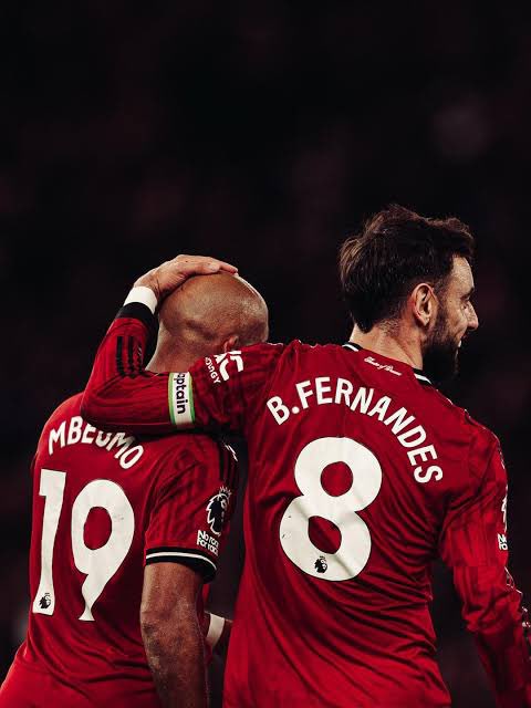 UTD_Seth001's tweet photo. 🚨Bryan Mbeumo on the player who has helped his development most since joining Manchester United:

🗣️ Bryan Mbeumo: “It’s Bruno. Without question, Bruno has helped me more than anyone since I arrived here.

I remember one of my first training sessions. After it finished, Bruno came over to me and said, ‘Bryan, you’re very good, but you’re playing football like you’re trying to prove you’re good.’

I laughed and asked him what he meant.

He said, ‘You don’t need to touch the ball five times. Sometimes the best thing you can do is move before you receive it. Look at me before I get the ball, not after.’

That conversation stayed with me.

A few days later, he stopped me again and said, ‘You keep looking at the ball. Start looking at the space. The ball will come.’

Honestly, I went back to my room thinking, ‘Maybe I don’t know how to play football.’ [laughs]

Because I realised I had been thinking about the game in one way my whole career, and Bruno was showing me another level of understanding.

He helped me understand when to run, when to slow down, when to come inside and, most importantly, how to make life easier for the player giving you the ball.

Sometimes he’ll shout at me during training and I’ll think, ‘Why are you shouting at me?’ Then five seconds later, I understand exactly what he saw.

That’s what makes him special.

Bruno hasn’t just helped me become a better player. He’s helped me understand football differently.

And I think that’s one of the biggest things you can receive from a teammate.”