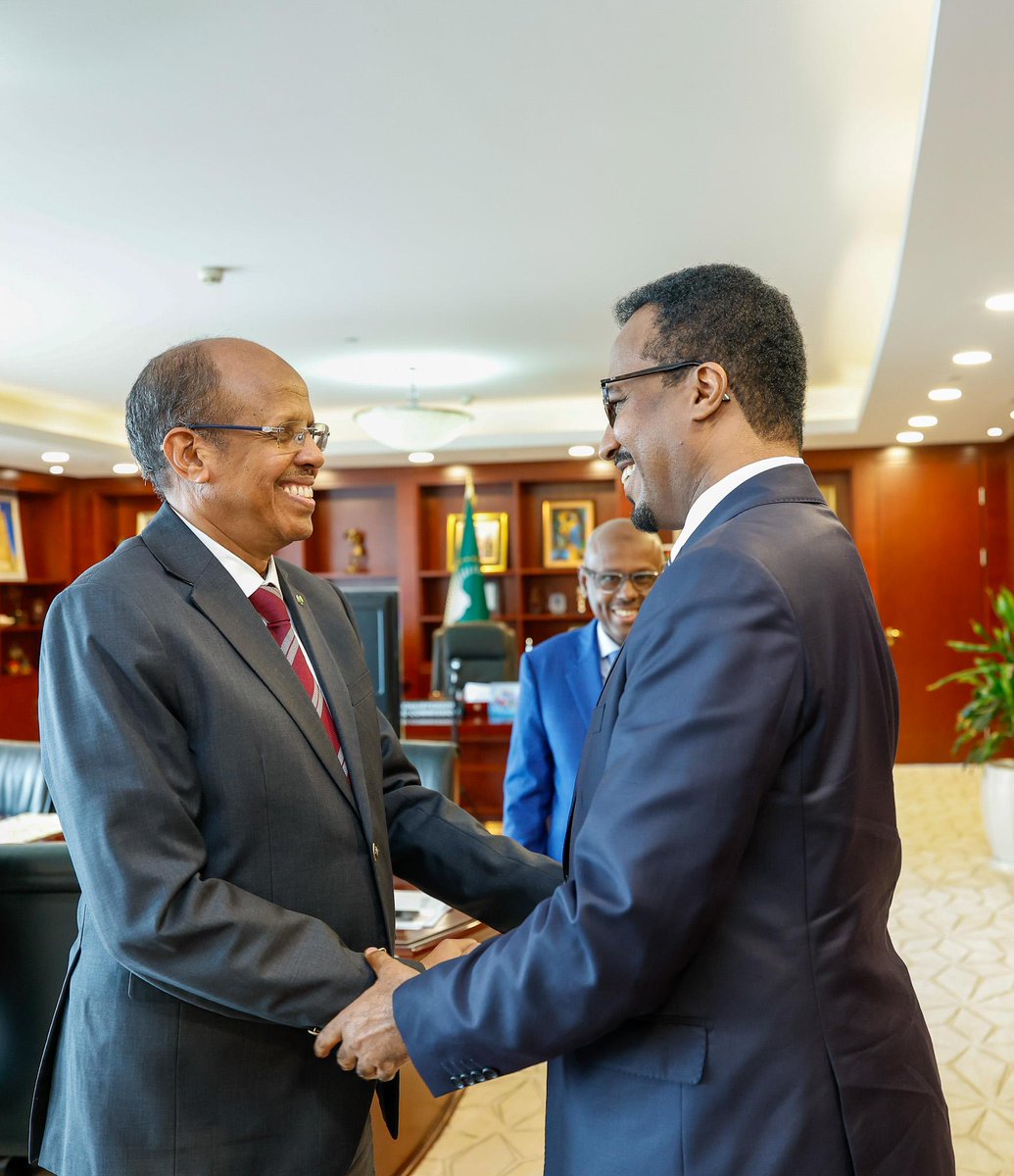 _AfricanUnion's tweet photo. The Chairperson of the African Union (AU) Commission, H.E. Mahmoud Ali Youssouf, this morning received H.E. Gamal Mohamed Hassan, Minister of Commerce and Industry of the Federal Republic of #Somalia, at the AU Headquarters in Addis Ababa, during a courtesy visit.

The Chairperson congratulated Somalia on the ratification of the Agreement establishing the African Continental Free Trade Area (AfCFTA), describing it as an important step towards deepening Somalia’s integration into the continental market & advancing the objectives of Africa’s economic integration agenda. He underscored Somalia’s significant potential to contribute to intra-African trade & investment, noting the country’s long-standing commercial traditions, entrepreneurial dynamism & historic trading links across the continent & beyond.

The Chairperson @ymahmoudali also commended the progress made by Somalia in advancing peace, security & stabilisation, emphasising that sustained peace & stability remain essential to unlocking the country’s economic potential & promoting inclusive development & regional integration.

Minister Gamal briefed the Chairperson on the inaugural Horn of Africa Trade Ministers’ Meeting, held in Addis Ababa under the framework of the Horn of Africa Initiative. The meeting brought together Trade Ministers from Djibouti, Ethiopia, Kenya & South Sudan, alongside representatives of Sudan & key development partners, to explore practical measures to enhance regional trade & economic cooperation, & establishment of a Trade Facilitation Roadmap and a regional coordination mechanism aimed at addressing barriers to trade and promoting greater economic growth and integration.

The Minister also provided an overview of the positive developments in Somalia’s trade & investment landscape, including growing investor confidence & increasing foreign investment. The Chairperson welcomed these developments, stressing the importance of strengthening regional economic cooperation & trade connectivity as important pillars for sustainable peace, stability and prosperity in the Horn of Africa.

Minister Gamal expressed appreciation for the AU’s continued support to Somalia’s stabilisation efforts & paid tribute to the Troop-Contributing Countries for their commitment & sacrifices in support of peace & security in the country. He underscored the importance of sustained AU & international support as Somalia continues its efforts to progressively assume greater responsibility & ownership for its national security & stabilisation.

In this regard, the Chairperson reaffirmed the AU’s principled commitment to supporting Somalia’s journey towards lasting peace, security & stability. He assured the Minister that the AU would continue to work closely with the Federal Government of Somalia, Troop-Contributing Countries & international partners to support Somali-led efforts towards the progressive assumption of responsibility for the country’s security & the realisation of a peaceful, stable & prosperous Somalia.

@mocisom @MOFASomalia @TheVillaSomalia

Read @ https://t.co/tLizNc10va
