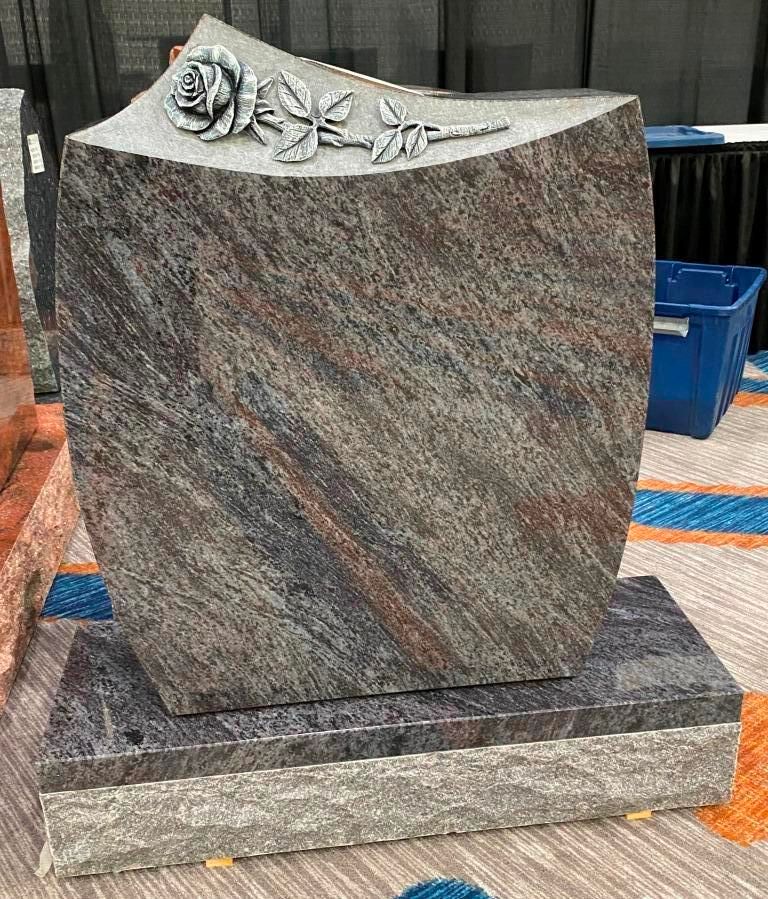 ShaferMemorials's tweet photo. Featuring a Sculpted rose with antiqued finish, set into the monuments sanded top area; it's flowing texture complements the granite color for timeless elegance. 
#InteriorDesign #Stoneart #craftsmanship #cemetery #headstone #familyowned https://t.co/FBvxnYwCEM
