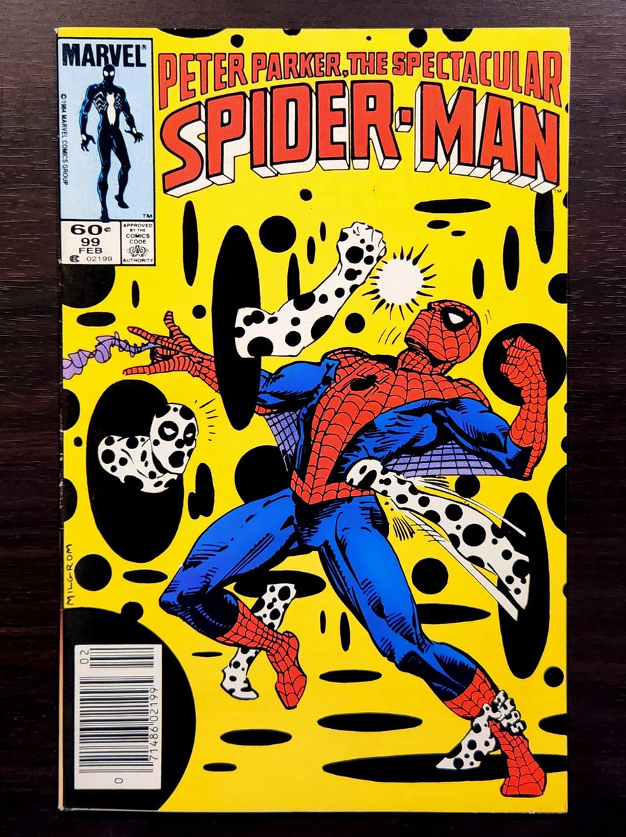 gulfcoastspidey's tweet photo. Spider-Man and the Black Cat confront the newly-minted villain, the Spot, in "Spider on the Spot!" from PPSSM vol.1 no.99 from Feb 1985, written by Al Milgrom with cover art also from Al Milgrom, while the alien symbiote costume makes its escape from captivity! While heading to confront the Kingpin, Spidey & Black Cat cross paths with the Spot, initially laughing at the villain's odd appearance, but the Spot uses his dimensional portals to dart around & land surprisingly long-distance punches on the pair! Spot overpowers a dazed Spider-Man by dragging him through a portal & slamming him into a wall, then gives them a warning to stay away from the Kingpin before escaping! #spectacularspiderman