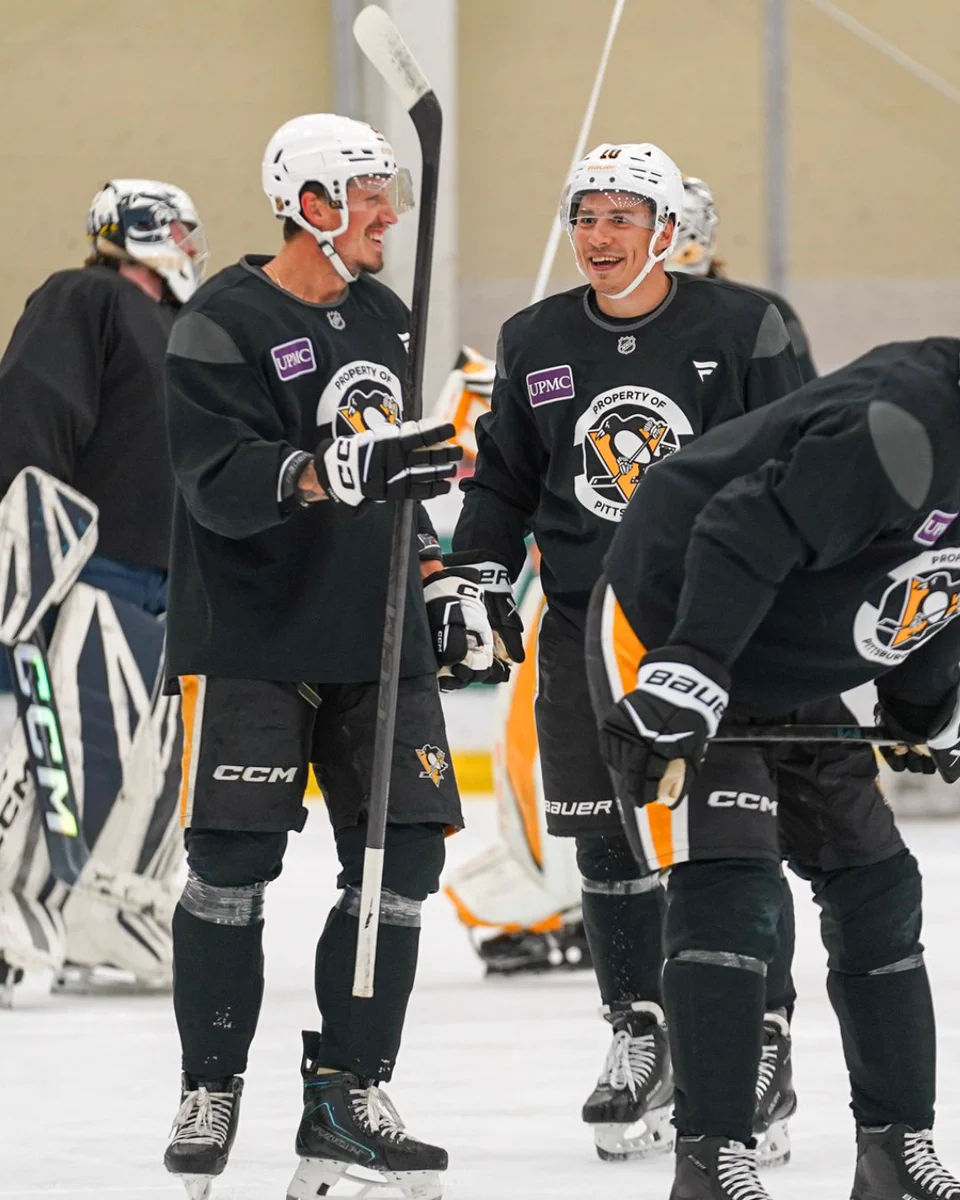 Andrei Kuzmenko and Rickard Rakell at practice.