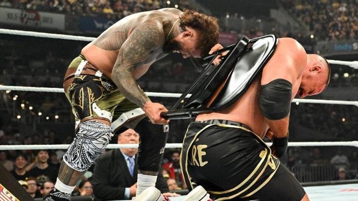 RxulRamos's tweet photo. @WWEUsos You injured yourself HITTING SOMEONE ELSE WITH A CHAIR. That makes you the best? https://t.co/ZpMz7E95EG