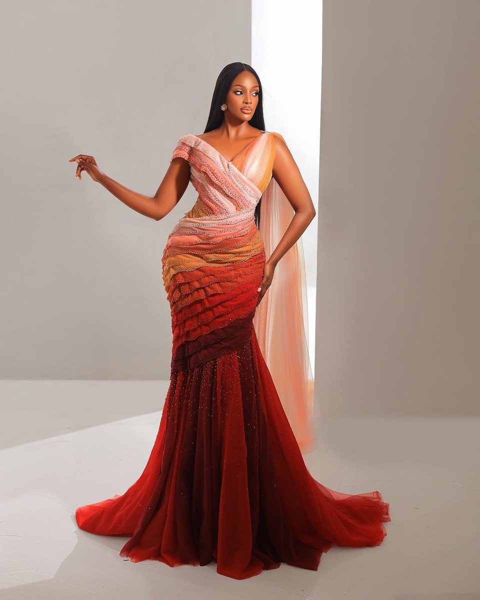 NoFilterSkin's tweet photo. Miss Uganda wore a dress representing the 7 surgical layers of a C-section, honoring the strength and beauty of motherhood https://t.co/jl8tNUsJQS