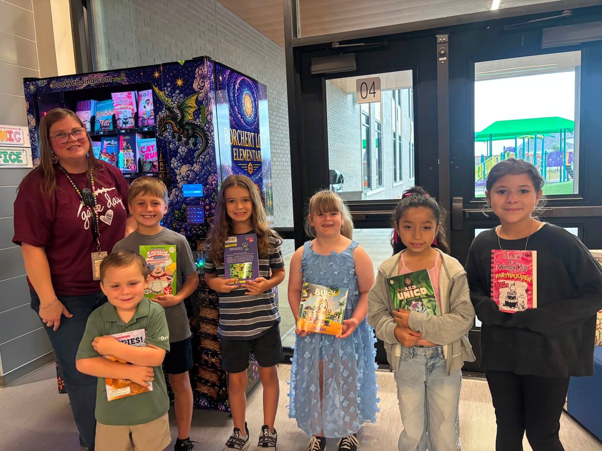 LockhartISD's tweet photo. ๐โจ Insert achievement. Select a book. Celebrate! Borchert Loop unveiled its brand-new book vending machine! ๐ฆ Students can earn books for attendance wins, reading milestones, goal achievements & moreโand take them home to build their own libraries! ๐โค๏ธ
#LockedInForLockhart https://t.co/uC9HrTa412